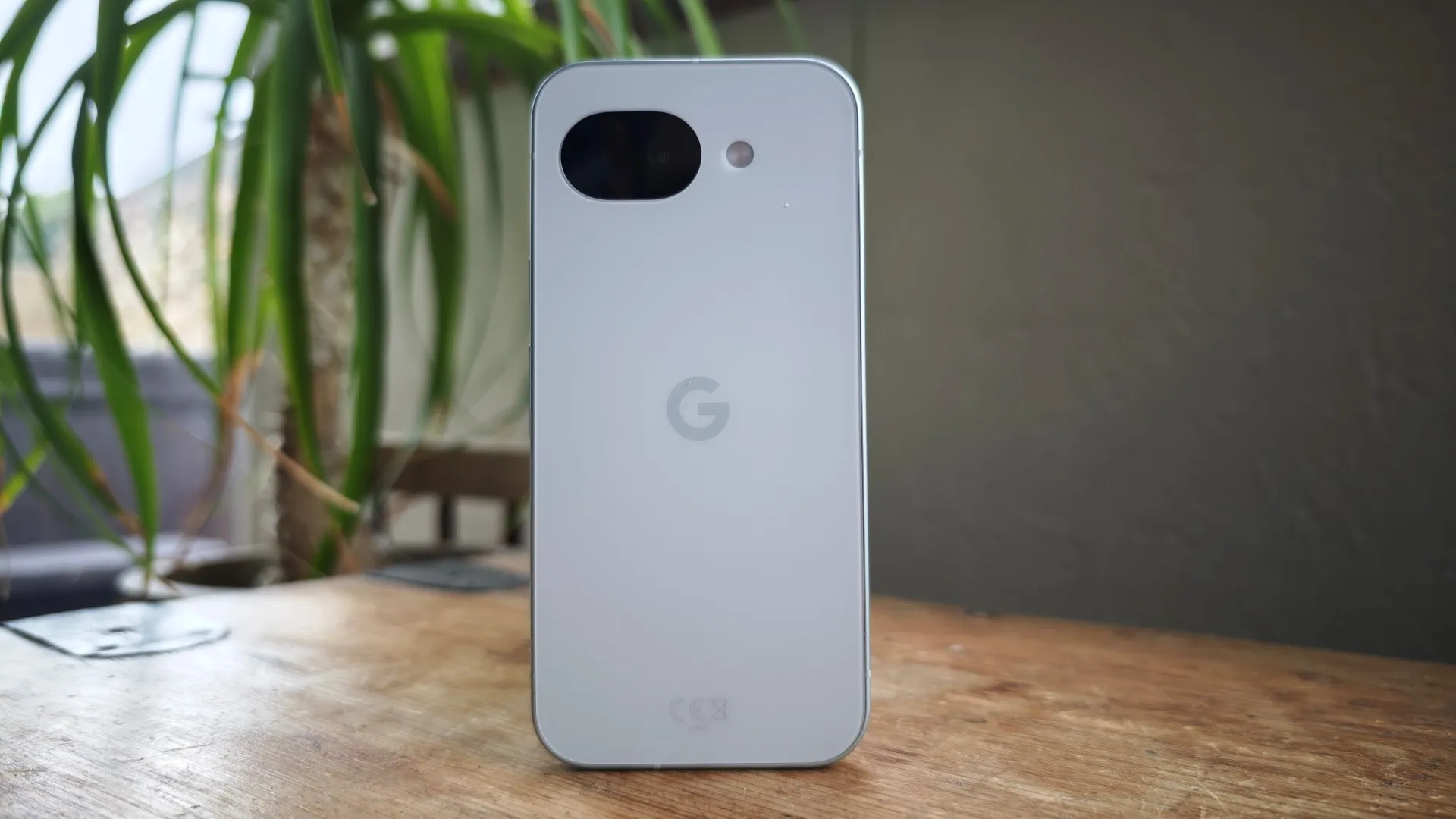 Render of Google Pixel 11a showing its slim camera oval and Orchid colour finish